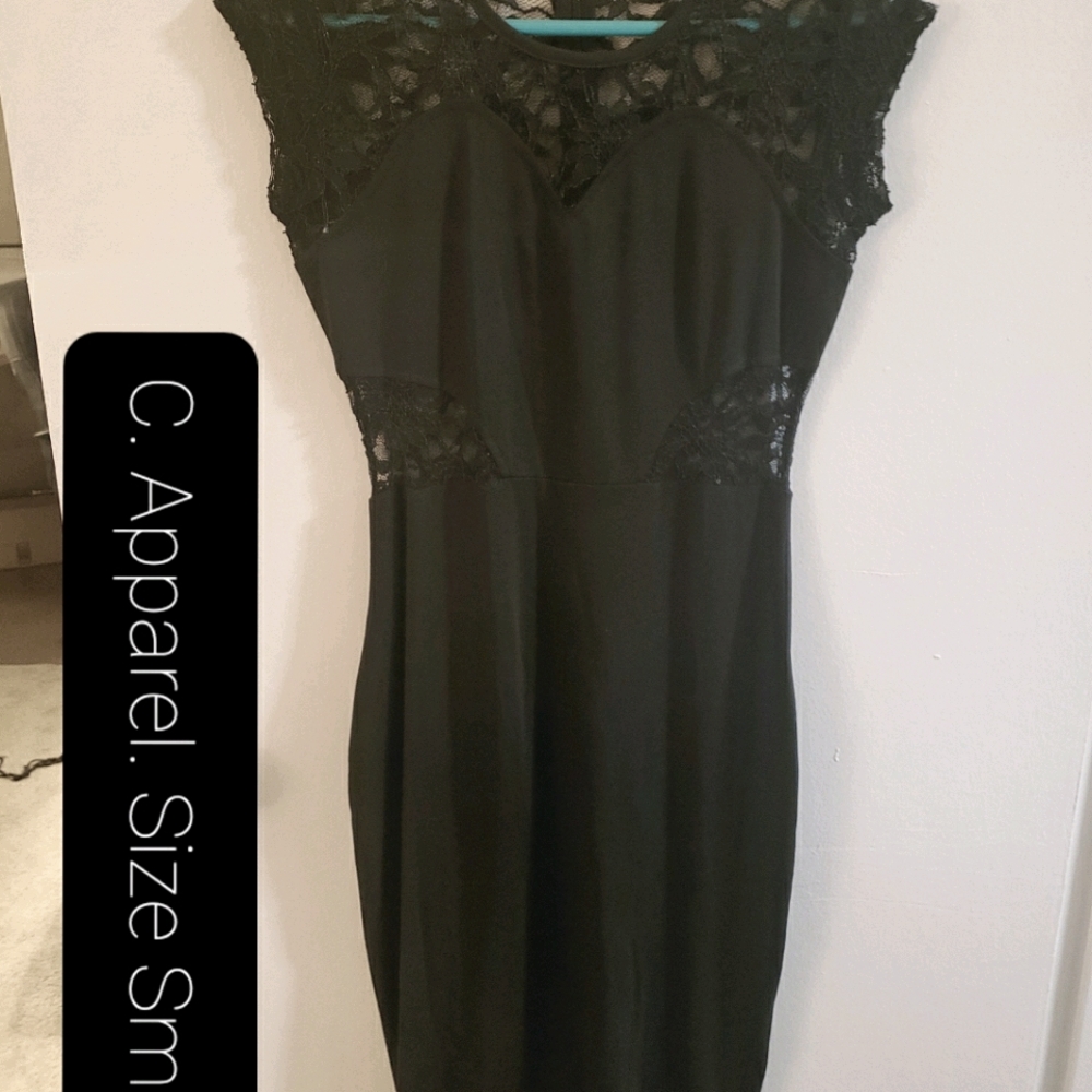 Black dress with lace detail, peekaboo side